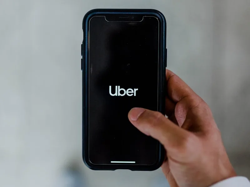 person holding black smartphone